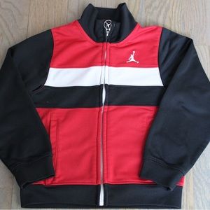 black jacket with red and white Jordan brand